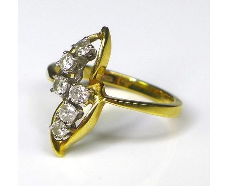 An 18ct gold and diamond ring of seedpod design, composed of six diamonds each of approximately 0.04ct, size M, 3.5g. 