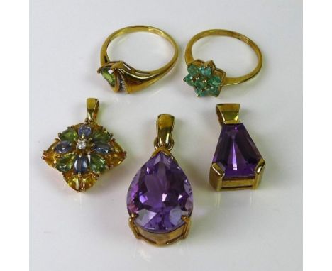 A group of 9ct gold jewellery, comprising an amethyst and diamond pendant, the large pear cut amethyst of approximately 19.16