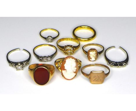 A group of ten gold, yellow and white metal rings, comprising a 22ct yellow gold wedding band, size J/K, 6.2g, a 14ct yellow 