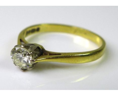 An 18ct gold and diamond solitaire ring, having a single diamond of approximately 0.25ct, size N, 2.2g. 