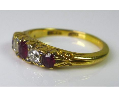 A Victorian 18ct gold five stone ring alternately set with diamonds and rubies, approx 0.3cts total diamond weight, size P, 4