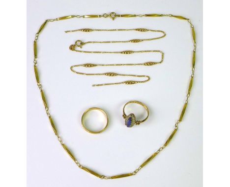 A selection of 9ct gold jewellery, including a 9ct gold ring set with marquis shaped blue stone encircled by paste stones, si