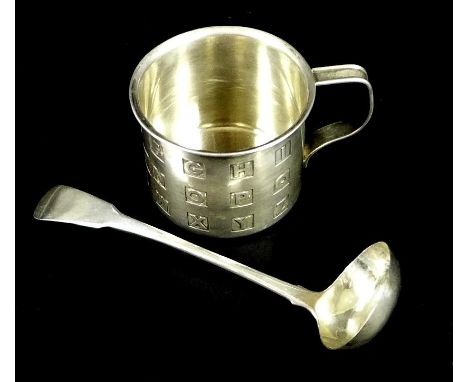 A Cartier silver christening cup, of small can form with alphabet design, marked to the base Cartier with insignia and Sterli