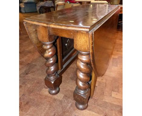 Early 20th century oak gate-leg dining table with bulbous barleytwist legs Condition report: see terms and conditions