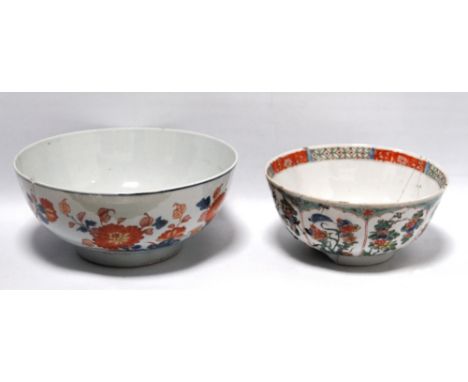 Chinese Kangxi famille verte bowl with enamel floral panels, stapled, 9cm high, and a 19th century Chinese footed bowl, repai