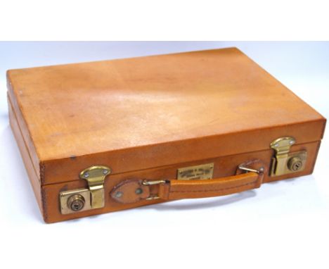 Holland & Holland light tan leather magazine case with brass locks and plate engraved 'Holland & Holland, Bruton Street, Lond