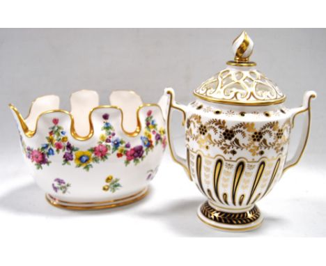 Royal Worcester Heritage Collection pot pourri of urn form, 18cm, and an oval floral decorated planter, 11cm high.  (2)