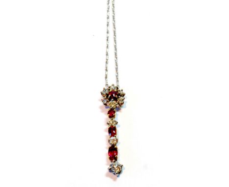 Ruby and diamond pendant with single ruby and six diamond cluster, with similar drop with three of each, in 18ct white gold.