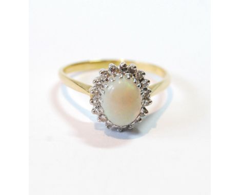 Opal and diamond oval cluster ring, in 18ct gold.   Condition Report  Size T