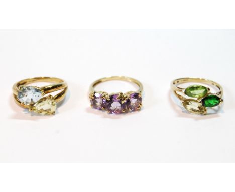 Three-stone amethyst ring and two others, citrine with blue diopside and citrine and peridot, all 9ct gold.   Condition Repor