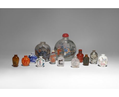 THIRTEEN CHINESE SNUFF BOTTLES LATE QING DYNASTY/ REPUBLIC PERIOD Seven in glass and six in porcelain, variously decorated wi