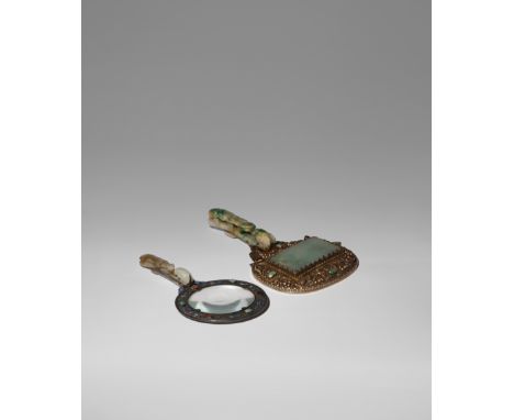 A CHINESE MAGNIFYING GLASS AND A HAND MIRROR LATE QING DYNASTY/ REPUBLIC PERIOD Both with jade handles formed from belt hooks