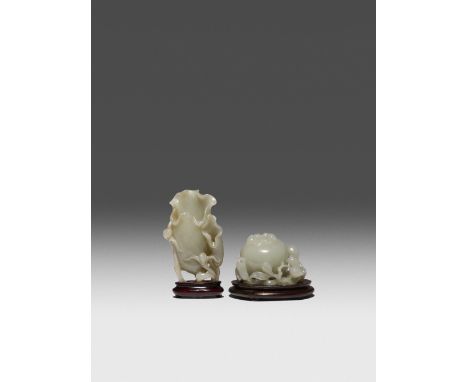 A SMALL CHINESE CELADON JADE VASE AND A JADE WATERPOT QING DYNASTY OR LATER The vase carved as elongated lotus leaves, the wa