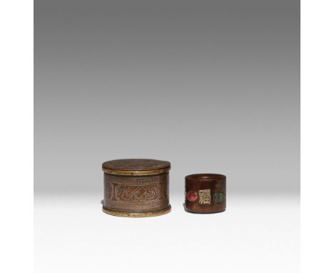 A CHINESE HARDWOOD ARCHER'S RING AND A SILVER-INLAID BOX AND COVER QING DYNASTY The ring decorated with a band of alternating