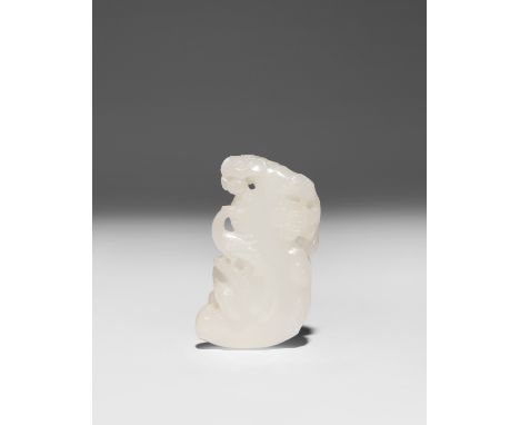 A CHINESE WHITE JADE PENDANT QING DYNASTY Crisply carved as a large gnarled flowering prunus trunk, with a phoenix standing t