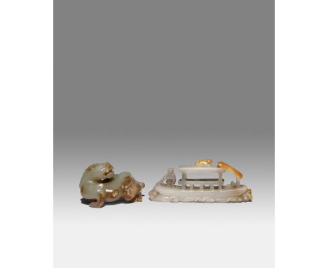 TWO CHINESE CELADON JADE CARVINGS OF A PIXIU AND A SAMPAN QING DYNASTY OR LATER One carved as a crouching beast with a bifurc