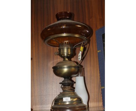 A VINTAGE LAMP AND GLASS SHADE