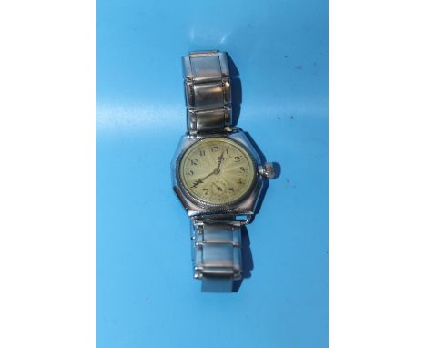 ROLEX AN EARLY GENTLEMAN'S OYSTER PRIMA, WITH CHROME PLATED CASE AND LARGE WINDING CROWN, Engine turned dial with Roman numer