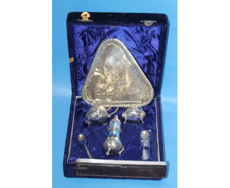 A CASED WHITE METAL CONDIMENT SET, AND A COMB