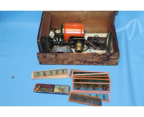 A MAGIC LANTERN PROJECTOR AND A SMALL COLLECTION OF SLIDES TO INCLUDE DONALD DUCK