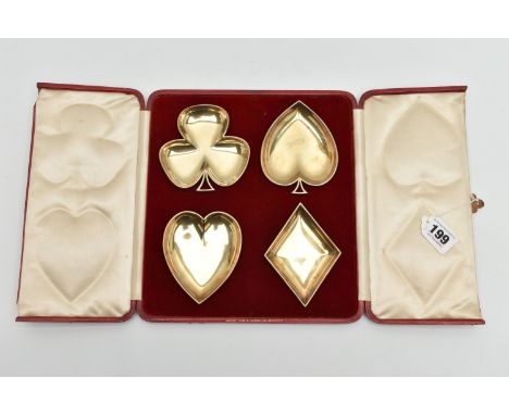 A CASED SET OF EDWARDIAN SILVER GILT DISHES IN THE FORM OF PLAYING CARD SUITS, maker's mark partially rubbed on all, London 1