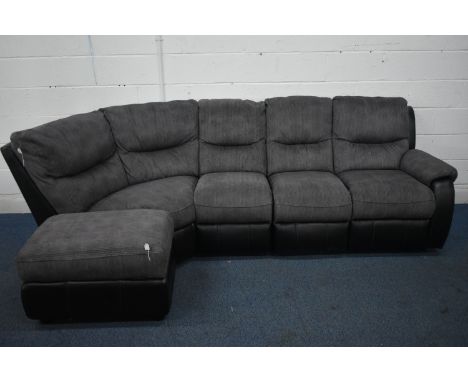 A BLACK LEATHER AND FABRIC CORNER SUITE, that splits into five sections, one section with a manual recliner, length 120cm x d