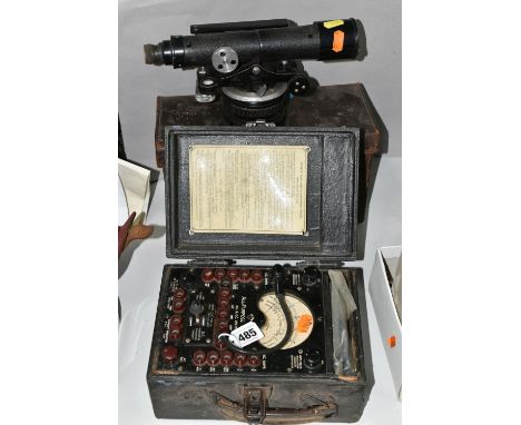 AN EVERETT EDGCUMBE ALL-PURPOSE VOLT TESTER AND AN E. R. WATTS &amp; SON LTD SURVEYORS LEVEL, NO.58818, with worn leather car