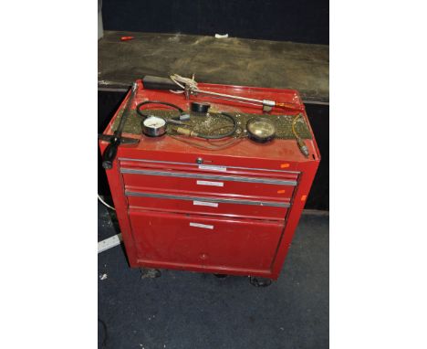 A MECHANICS METAL ROLLING WORKSHOP CABINET, with three drawers over a cupboard door, containing automotive tools and consumab