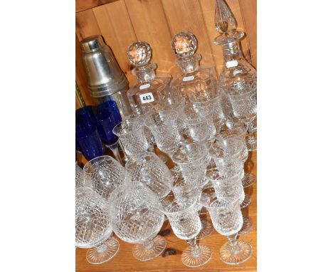 A GROUP OF CUT GLASSWARE, comprising a set of six cobalt blue wine glasses with clear twisted glass stems, a chrome musical c