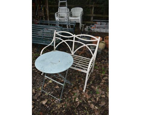 A MODERN ALUMINIUM GARDEN BENCH, length 110cm and a circular folding table (condition report: some rusting) (2)