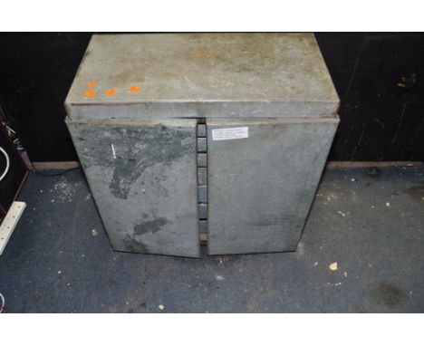 A GALVANISED STEEL ENGINEERS TOOL CABINET, with lift up lid concealing a lift out tray, above two doors concealing seven long