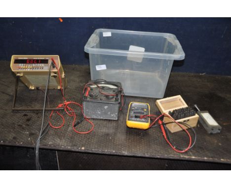 A TRAY CONTAINING ELECTRICAL TEST EQUIPMENT including a Racal-Dana 4002 (PAT pass and working), an Avo meter Universal , a IT