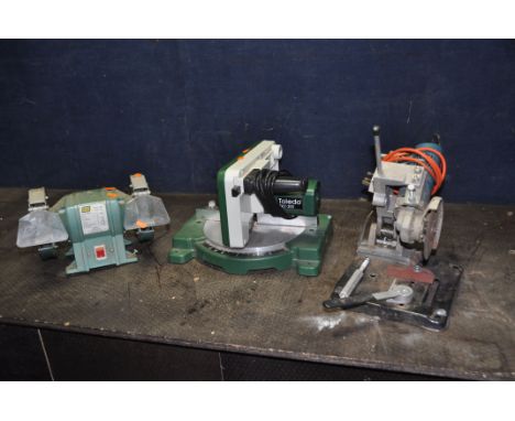 THREE POWER TOOLS including a Black and Decker angle grinder on stand, a Toledo Mitre saw and a Kinzo bench grinder (3) (all 