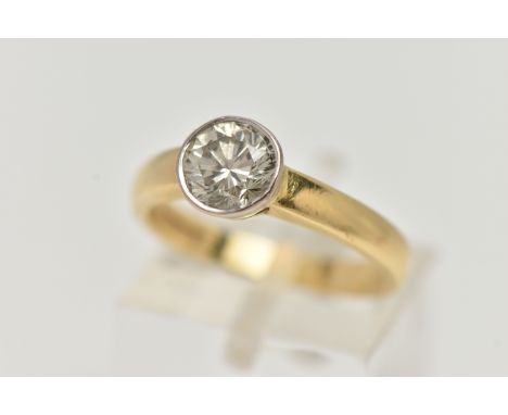 AN 18CT GOLD SINGLE STONE DIAMOND RING, the brilliant cut diamond within a collet setting to the plain band, stamped diamond 