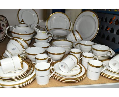 ROYAL DOULTON 'ROYAL GOLD' DESIGN DINNERWARE, comprising nine cups (one chipped foot), seven saucers (one marked as second qu