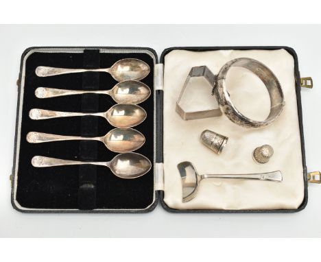 A SMALL QUANTITY OF SILVER ITEMS, to include a cased set of five teaspoons, hallmarked Birmingham, (one spoon is missing), a 