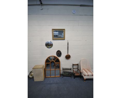 A SELECTION OF OCCASIONAL FURNITURE, to include a wall mirror with an arched top, four other mirrors, a pink painted wicker c
