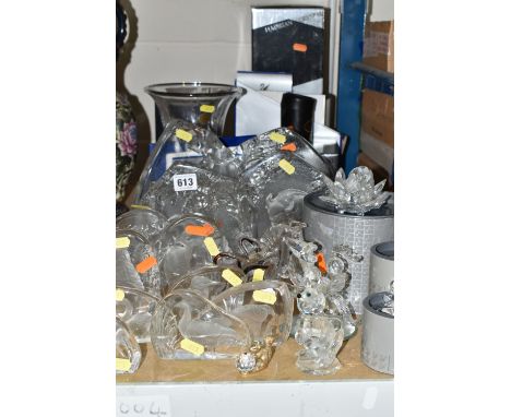 A COLLECTION OF TWELVE CRYSTAL PAPERWEIGHTS AND SWAROVSKI CRYSTAL SCULPTURES, comprising four large Goebel paperweights, Swan