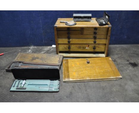 A MOORE AND WRIGHT ENGINEERS TOOL BOX, containing test and measuring equipment, with four short over three graduated drawers 