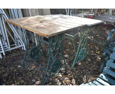 TWO VINTAGE TREADLE SEWING MACHINE BASES, one with a marble top, the other with a wooden top (2)
