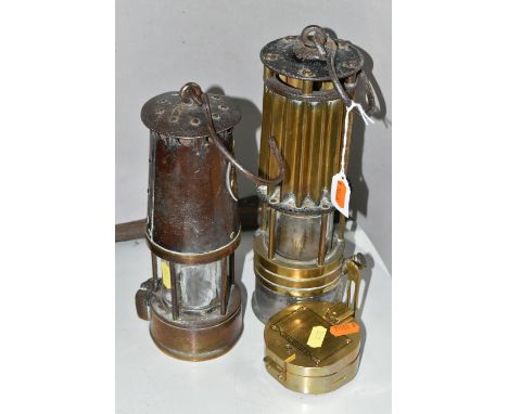 TWO BRASS MINERS LAMPS AND A BRASS COMPASS, one by The Industrial Rubber Products Co., London, the other an SL type No.83 by 