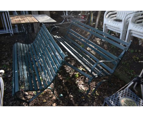 A PAINTED STRAPWORK IRON AND TEAK SCROLLED BENCH, length  145cm, along with another strapwork bench (condition report: on sla