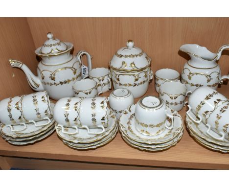 A 19TH CENTURY FRENCH PORCELAIN GILT TEA SET, decorated with a gold gilt foliate design, comprising a teapot, incised number 