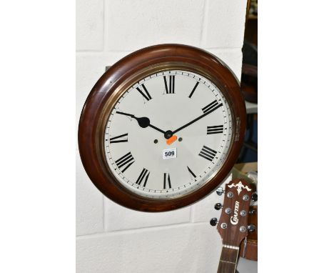 A MAHOGANY CASED CHIMING WALL CLOCK, having a painted dial with roman numeral hour markers, approximate diameter of face 30.5