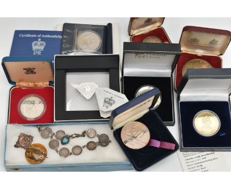 A QUANTITY OF BOXED SILVER COINAGE, to include a Silver Pobjoy Diamond shaped Silver coin, 2x Winton Churchill boxed Silver M