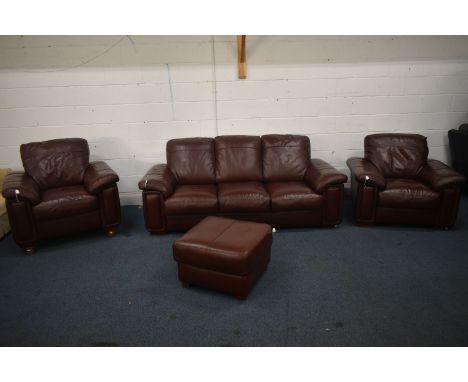 A BROWN LEATHER FOUR PIECE LOUNGE SUITE, comprising a three seater settee, length 216cm x depth 99cm x height 79cm, a pair of