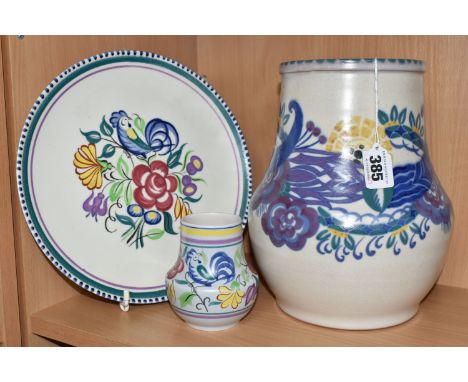 THREE PIECES OF POOLE POTTERY, comprising a large 1920s/early 1930s Carter, Stabler &amp; Adams vase, in red earthenware pain