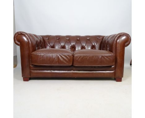 A contemporary studded brown leather button-back Chesterfield style 2-seater sofa, L165cm 