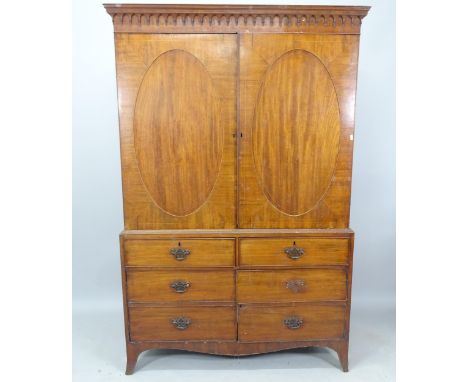 A 19th century mahogany 2-section linen press, the base fitted with 2 frieze drawers and dummy draw-fronts under, 122cm x 190