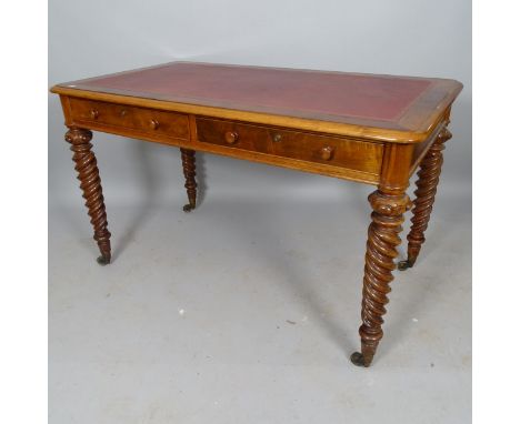 A 19th century mahogany writing table, with tooled and embossed red leather skiver, 2 fitted drawers, on spiral turned legs, 